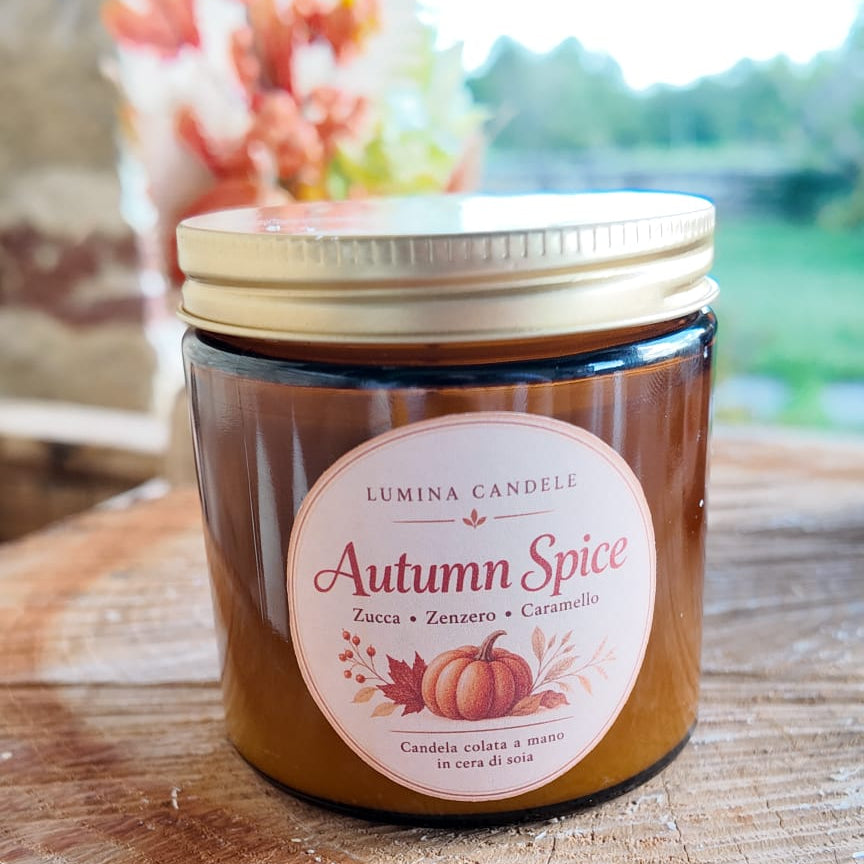 candele ambra in contenitore