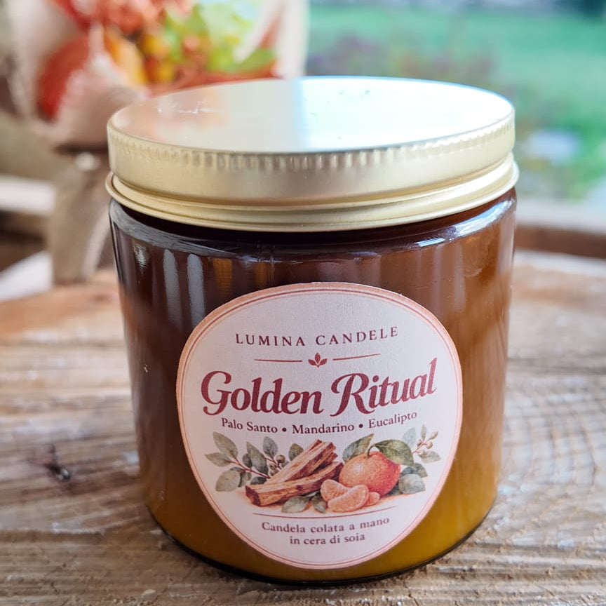 candele ambra in contenitore